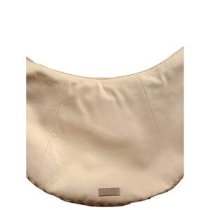 Vince Camuto clarq genuine leather warm vanilla crescent shaped hobo handbag NWT